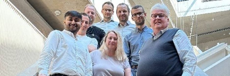 Hochreiter (right) with JKU and dSPACE employees; photo credit: dSPACE