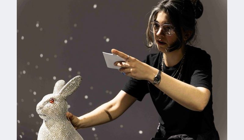 Actor with rabbits